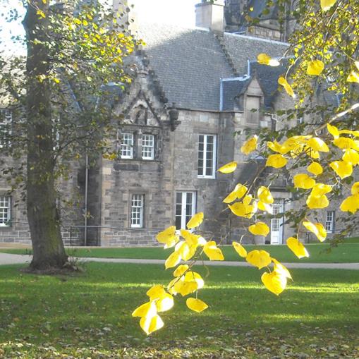 Grounds with historic building in the background