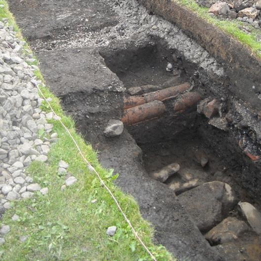 Archaeological trench showing the original bowling green boundary