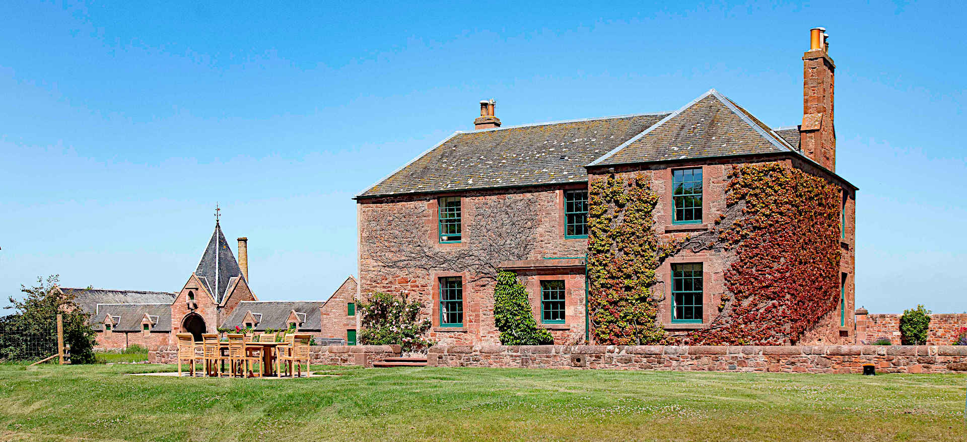 Papple House, Steading and grounds on a clear day.